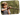 Mädchen trägt XGO3 Gen 2 Uhr im Grünen – Kindersicherheit mit GPS und Anrufen